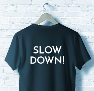 shirt with "Slow Down" on it